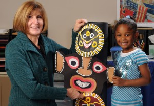 ART, little girl with totem pole