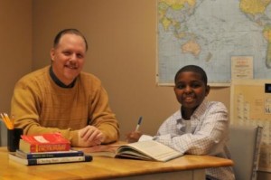 COMPRESSED Cute boy and male tutor