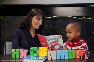Cute little boy with book